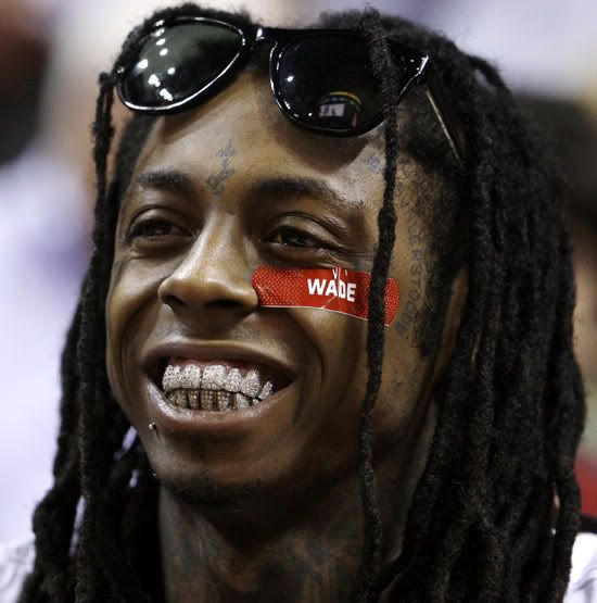 Lil-Wayne-diamonds-teeth-grill.jpg